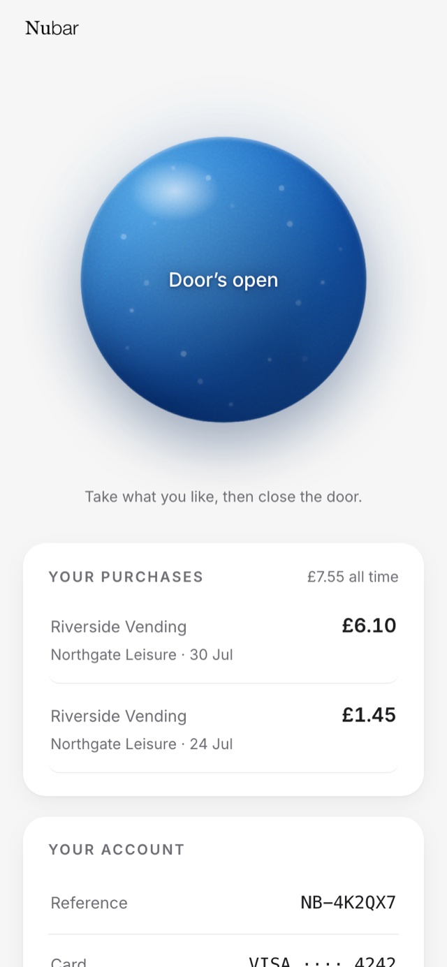 The phone showing a blue circle reading Door's open, with the instruction to take what you like then close the door.