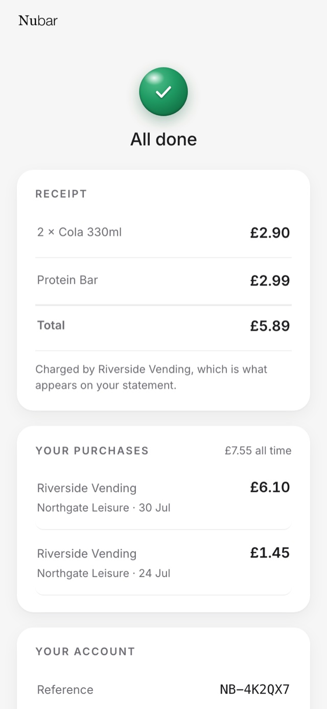 A receipt on the phone listing two colas at 2.90 and a protein bar at 2.99, totalling 5.89, charged by the operator.